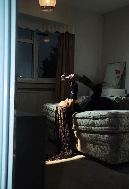 Artist pink pantheress wearing the grid vest in Brown & Black for Paper magazine