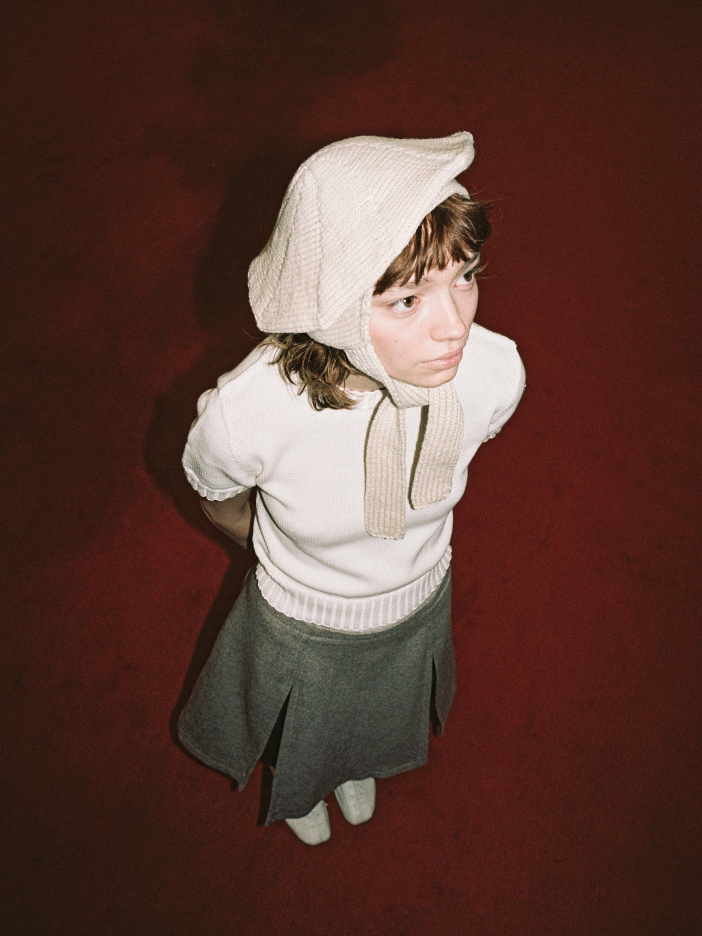 Model wearing Classic hat in ecru, with Oatmeal Ankle Pleat Skirt and t-shirt sweater in ecru