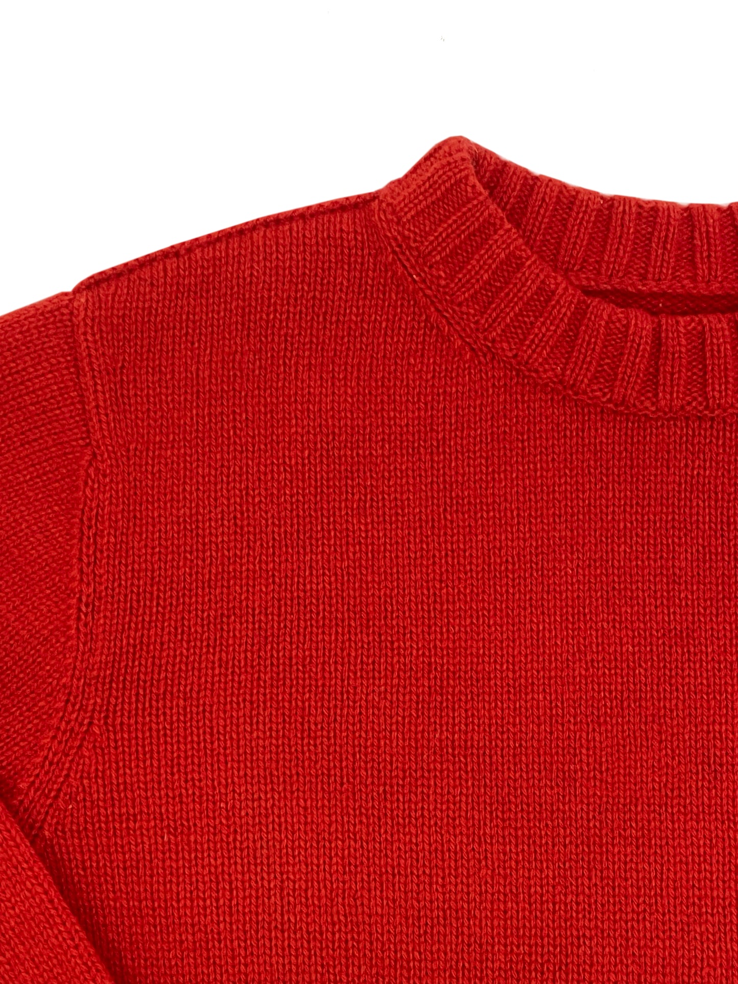 Close up of traditional sweater in red
