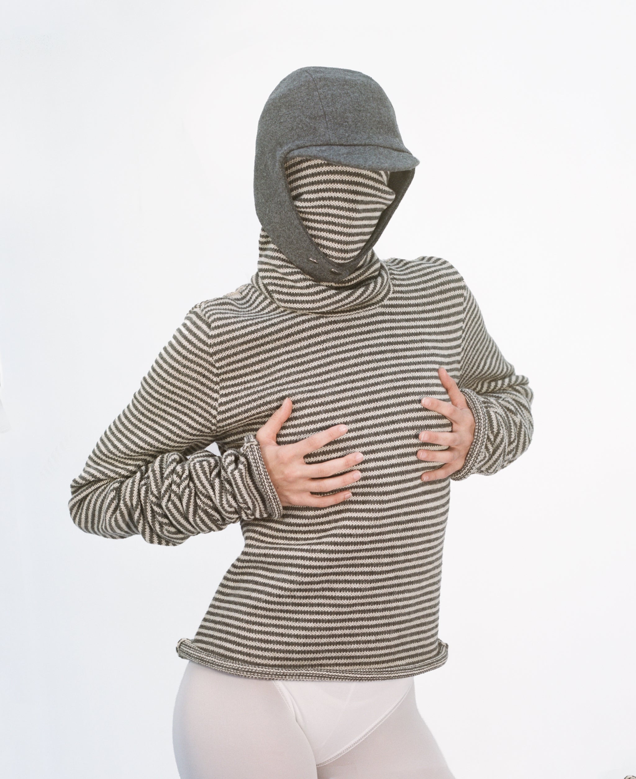 Model wearing Flying Hat and Stripy Double Snood top in Oatmeal & Grey