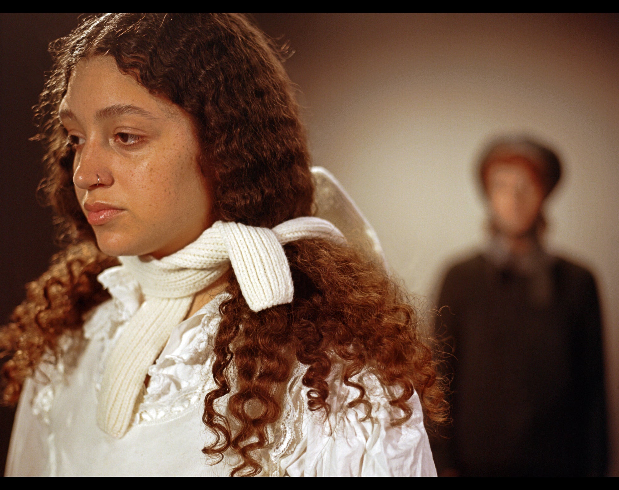 Model wearing the classic hat in Ecru