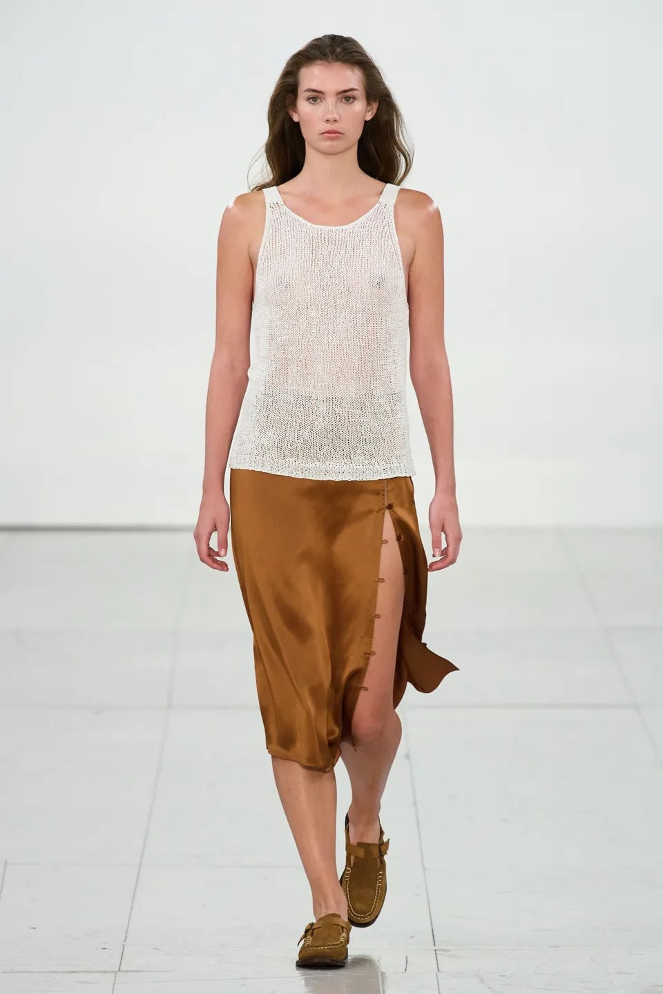 Linen Hand-knitted tank top with crochet straps.
Knit development for EFTYCHIA