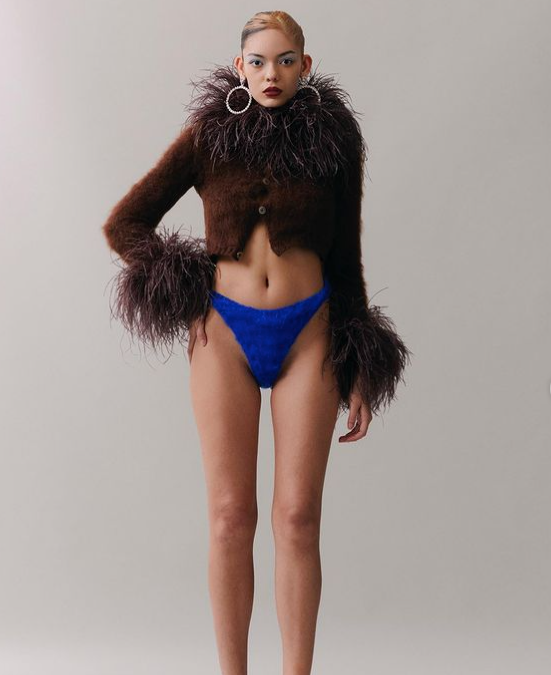 Knit development for Mimi Wade. Cardigan with ostrich feather collar