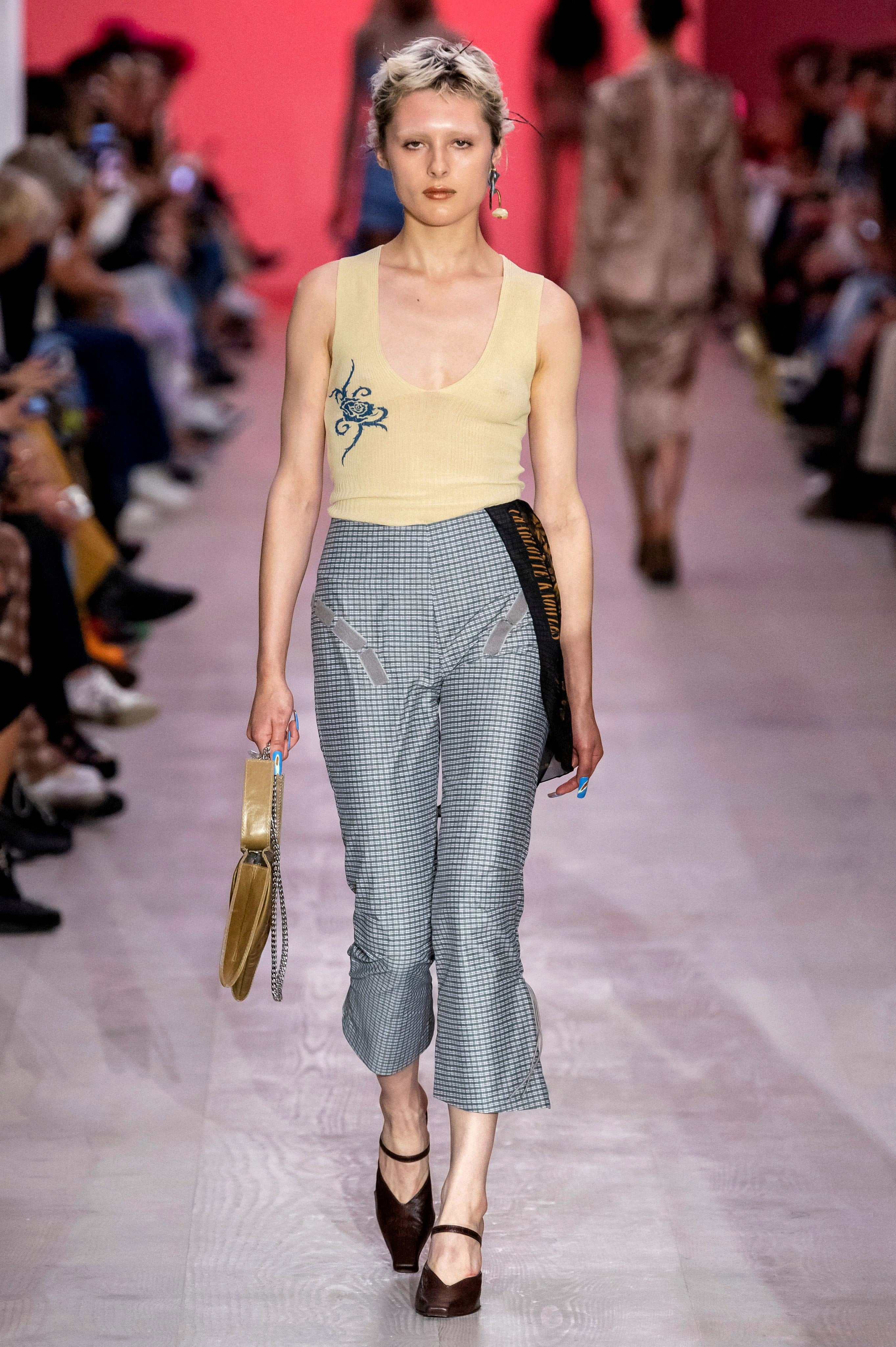 Runway look featuring white ribbed vest