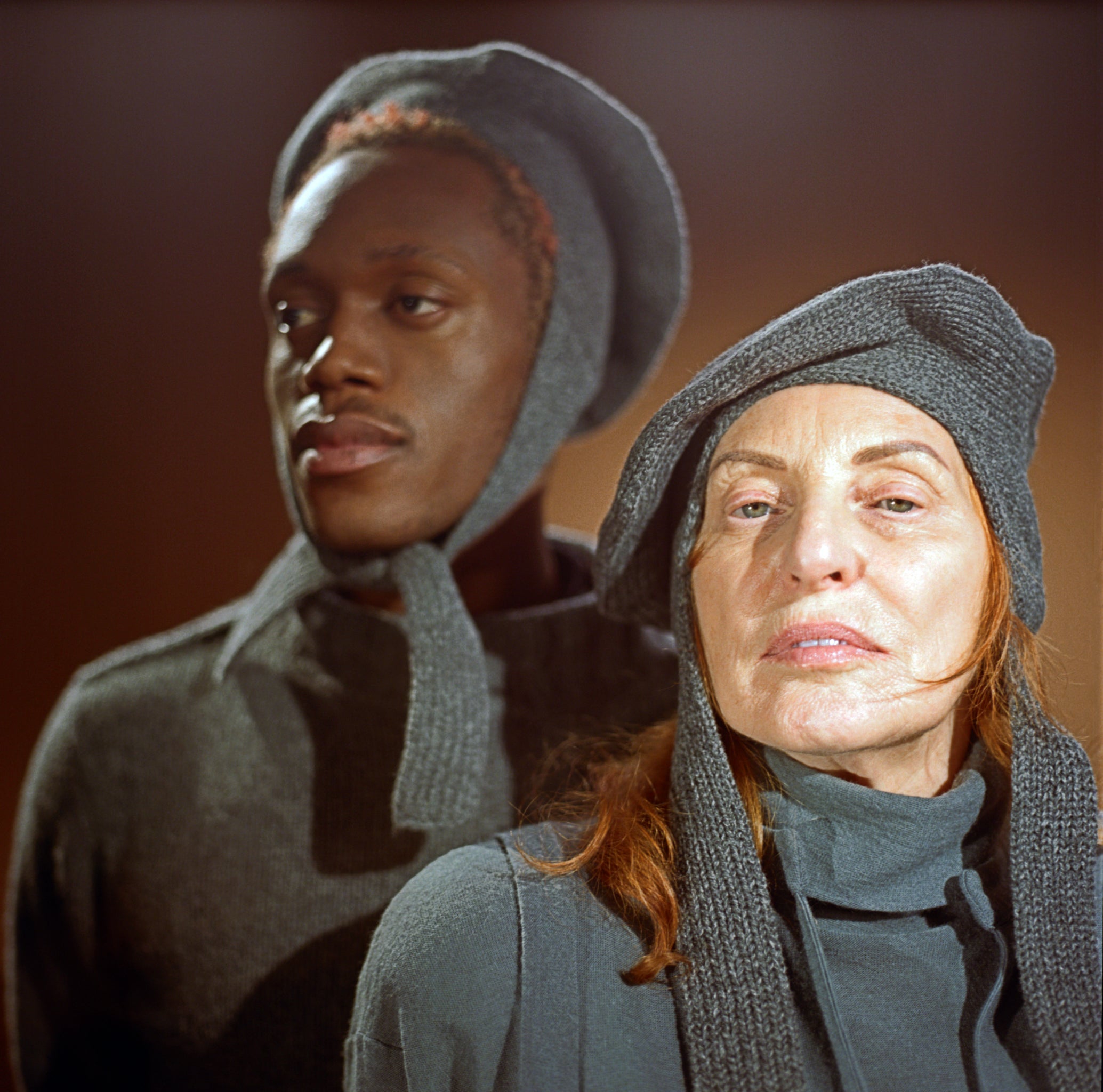 Models wearing the classic hat in Mid-grey