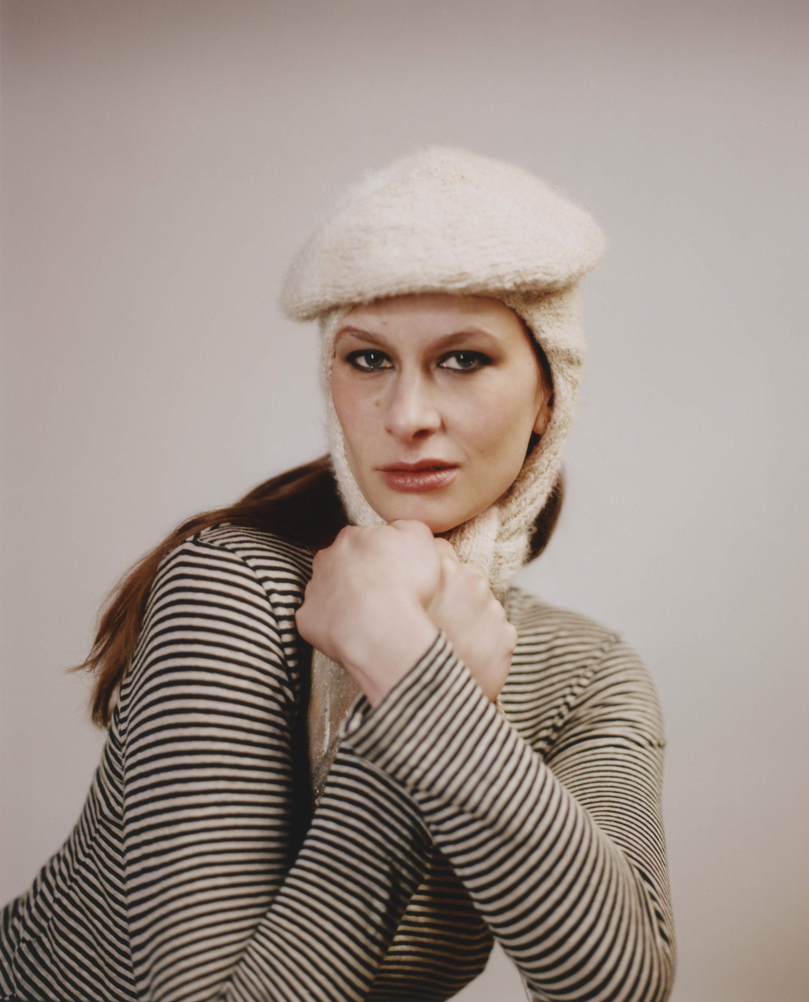 model wearing classic hat in ecru and striped top